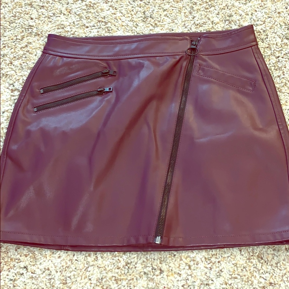 Express faux burgundy leather skirt. Size 8
